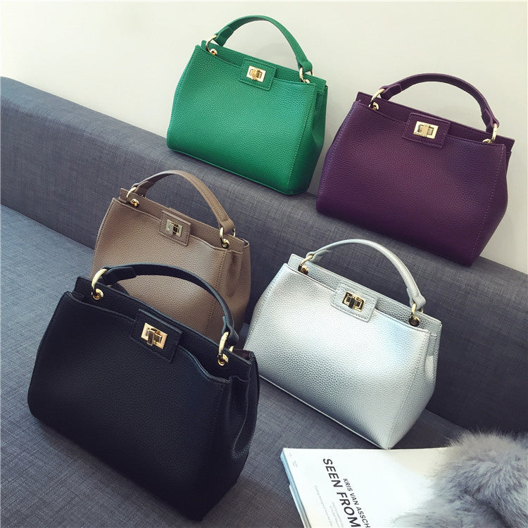 Stylish Women's Cat Bag with Gold Lock Closure