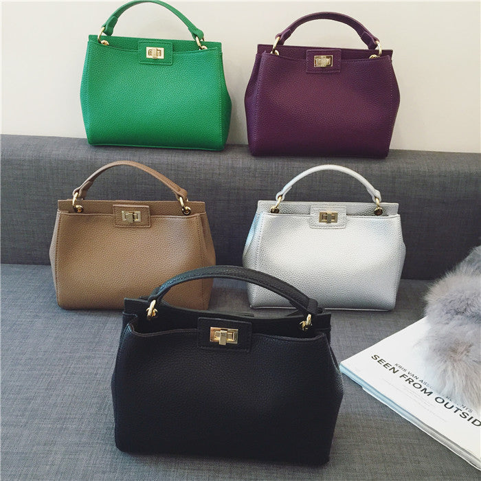 Stylish Women's Cat Bag with Gold Lock Closure